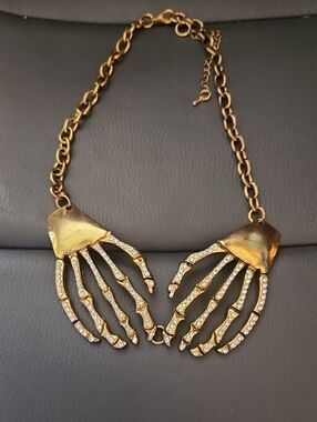 Gold-Tone Crystal Skeleton Hand Necklace